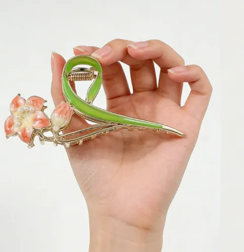 Pink Blossom Hair Claw · Hand View